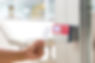 close-up-hand-security-man-using-id-card-scanning-at-the-access-control.jpg